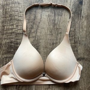 Magnetic front clasp plunge halter never worn